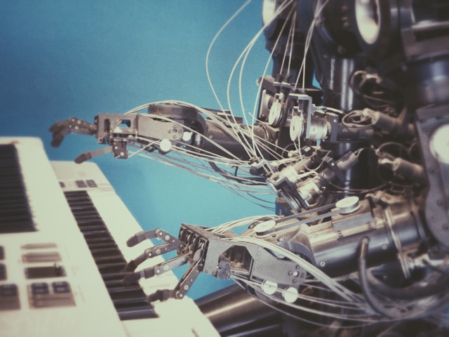 A robot playing the piano to make AI music.
